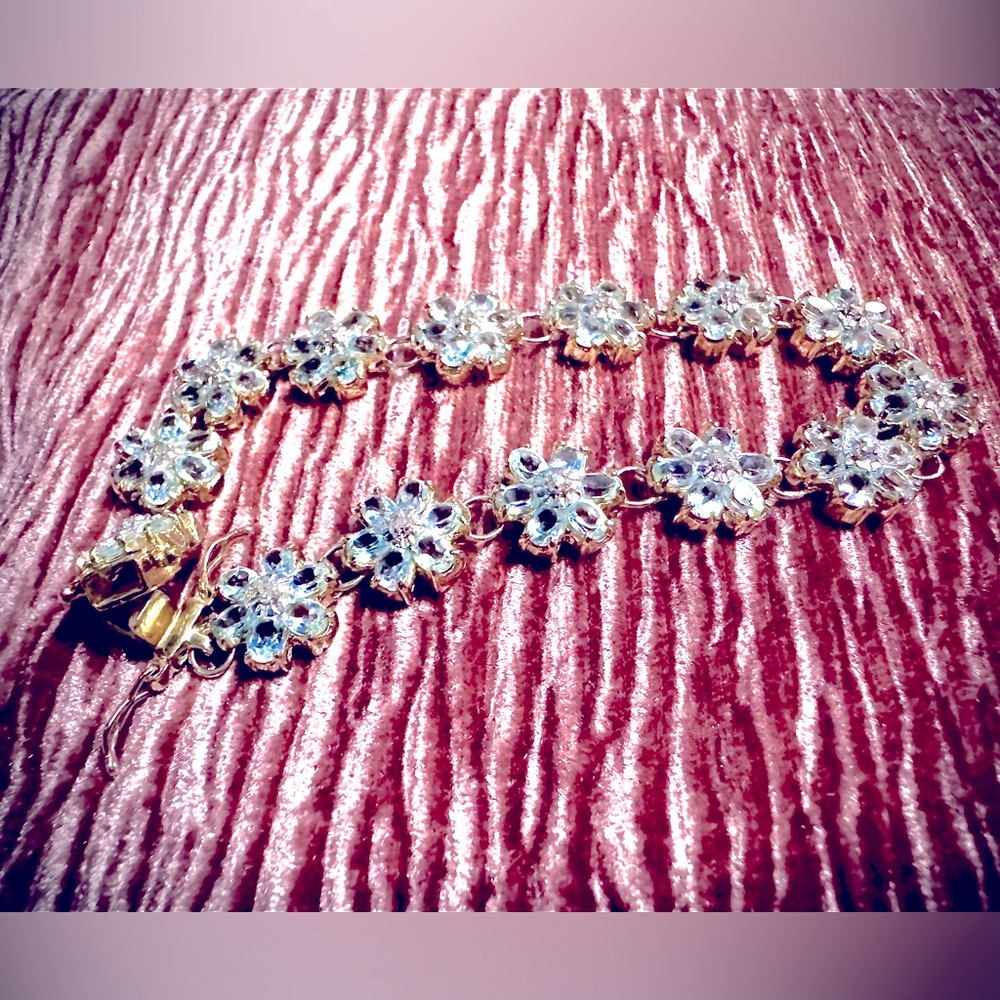 Diamond and topaz 18k gold tennis bracelet beautiful is bracelet